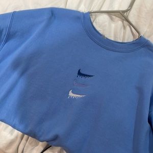 Light blue Nike crewneck